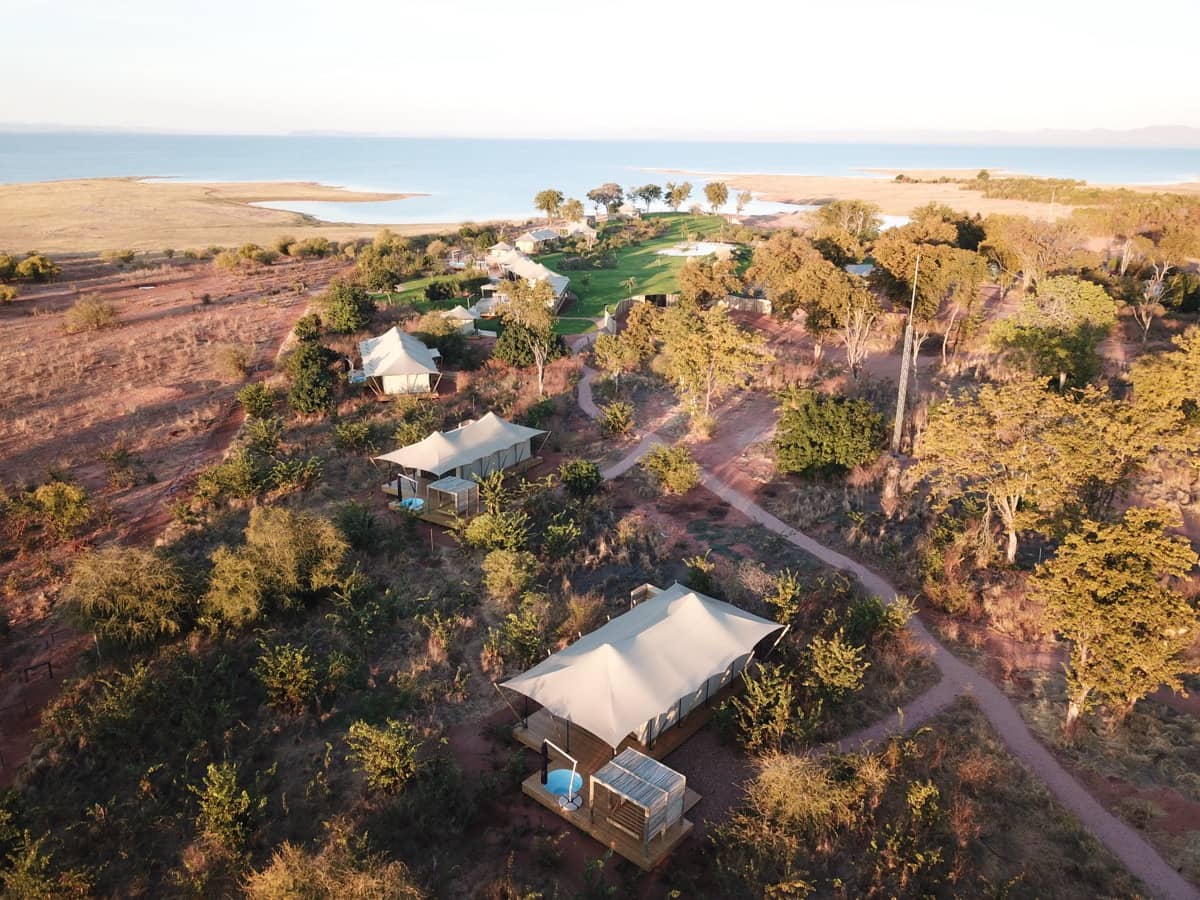 Aerial view of an off-grid site in green surroundings
